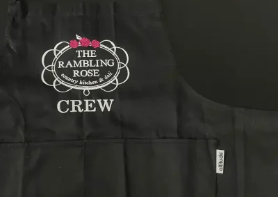 The Rambling Rose branded aprons